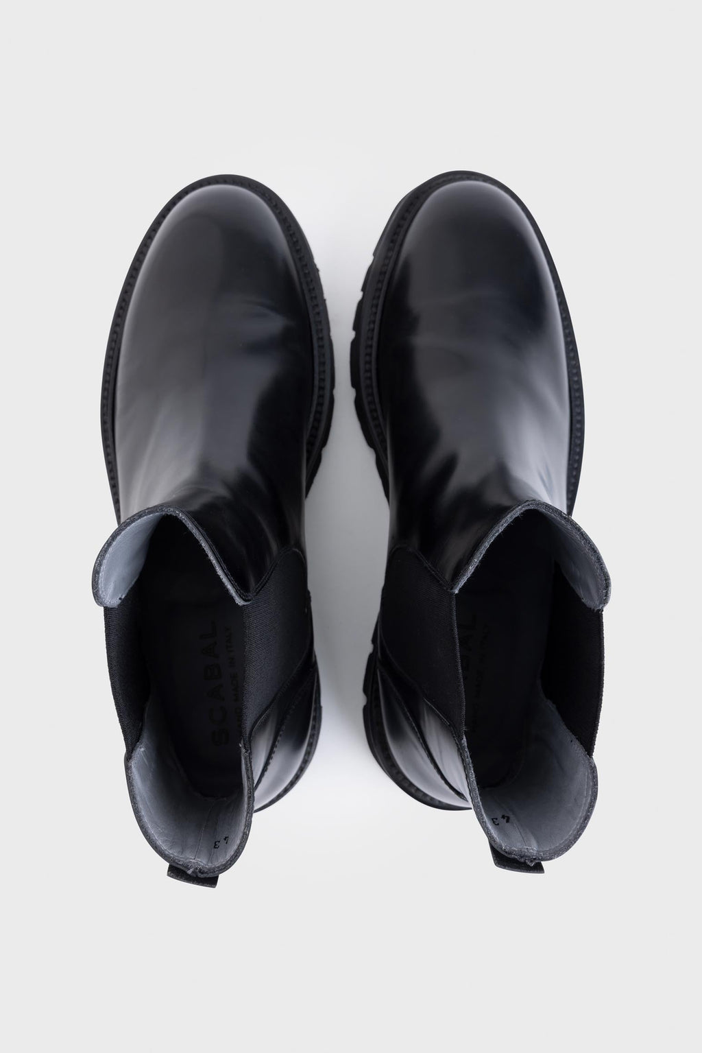 Black Glazed Calfskin Chelsea Boots — detail 1